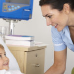 nurse caring for child
